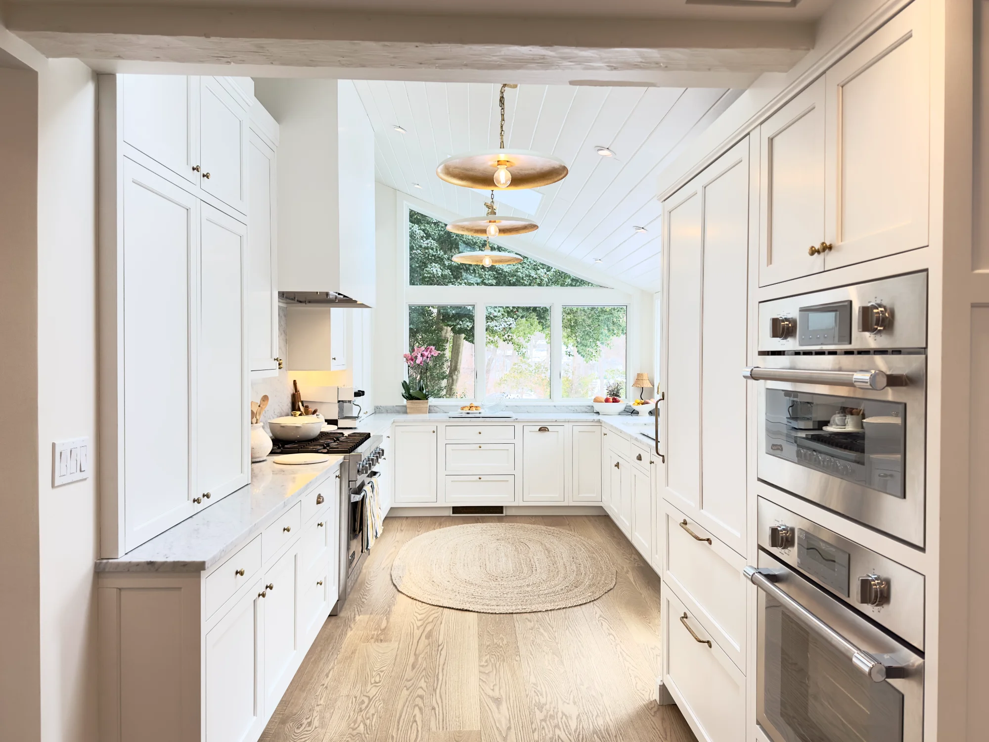 Bright, modern white kitchen design.